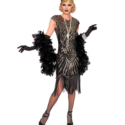 Flapper jurk goud zwart met art-decomotief, gedragen op een jaren 20-themafeest