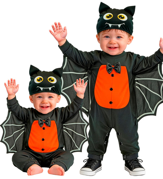 Vleermuis jumpsuit jongens in zwart met oranje bef, vleugels en muts met oogjes, in maat 80 en 98 cm