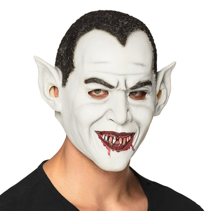 Latex hoofdmasker vampier in wit met zwarte puntige haarlijn en bloedrode tanden voor Halloween