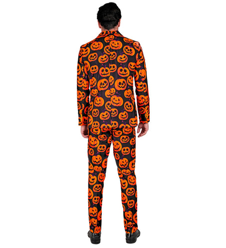 Achterkant van het pompoenpak met grijnzende pompoenkoppen over rug en broek