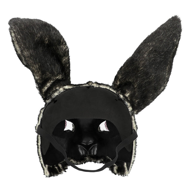 Binnenkant van pluchen konijnenmasker met gaasjes achter de oogopeningen