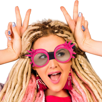 Bril steampunk roze met felroze spikes gedragen op het voorhoofd bij een neonfeest