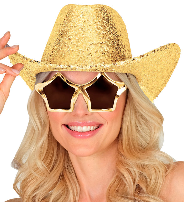 Cowboy hoed pailletten goud op het hoofd van een vrouw, rand omhoog gebogen