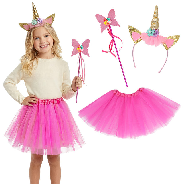 Eenhoorn verkleedset Fairylight roze met haarband, tulerok en vlinderstaf, gedragen door een meisje en los ernaast