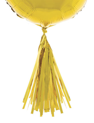 Goudkleurige pompon van 35 cm met glanzende slierten, geknoopt onder een ronde ballon