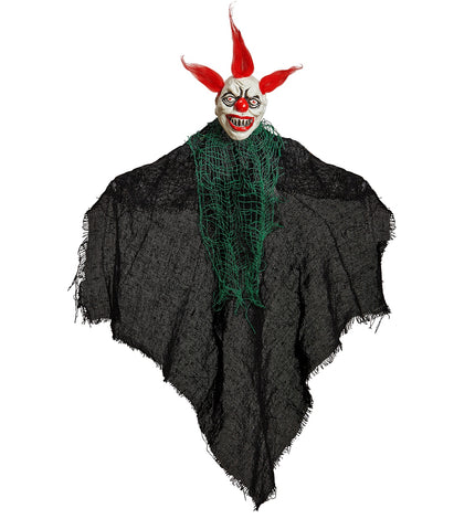 Griezelige clown decoratie in zwart gaasdoek met groene rafelkraag en rode haarplukken voor Halloween