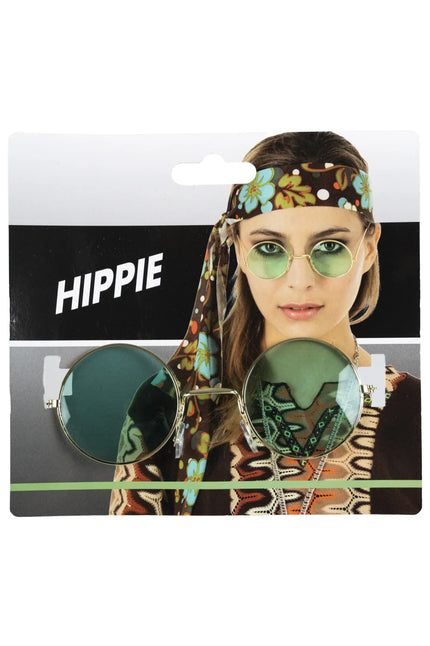 Hippiebril met goudkleurig montuur en ronde groene glazen op kaart, voor een jaren 60-feest