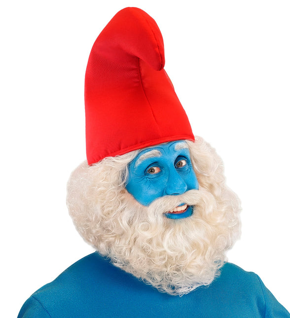 Hoed dwerg rood op het hoofd bij witte krulbaard en blauw geschminkt gezicht