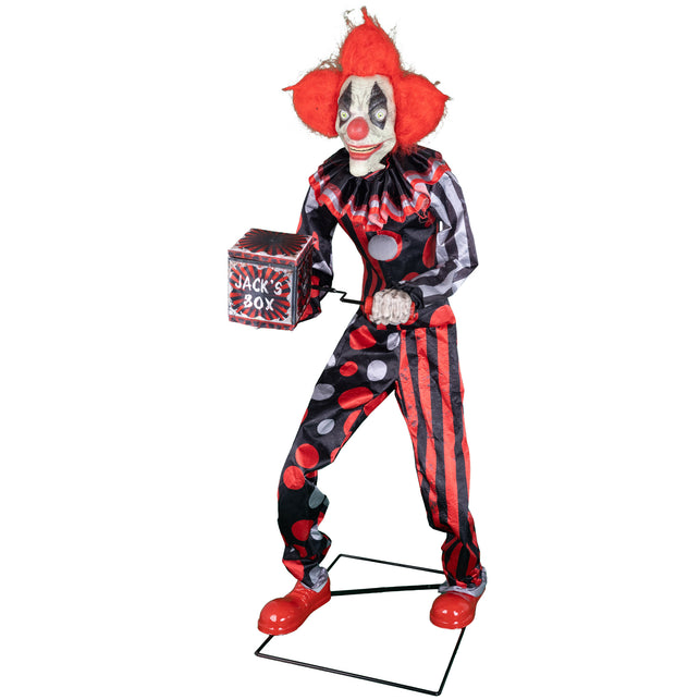 Horrorclown animatronic met kistje Jack's Box in de hand en rode clownsschoenen