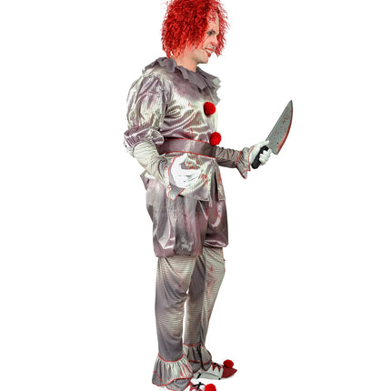 Killer clown kostuum zijaanzicht met gestreepte broek en overzetschoenen met rode bies