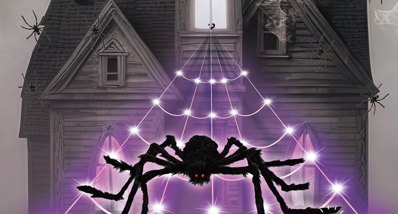 Led spinnenweb van 5 meter met violette lampjes en grote zwarte harige spin aan een spookhuis, Halloween decoratie
