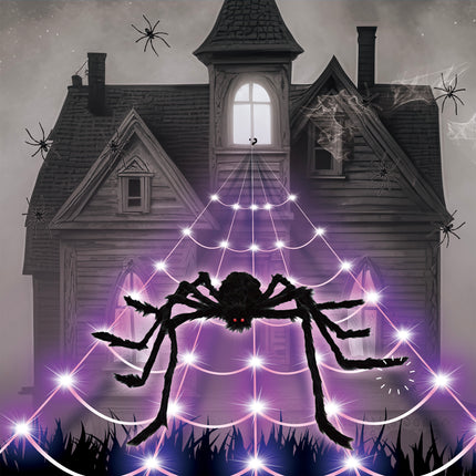 Led spinnenweb van 5 meter met violette lampjes en grote zwarte harige spin aan een spookhuis, Halloween decoratie