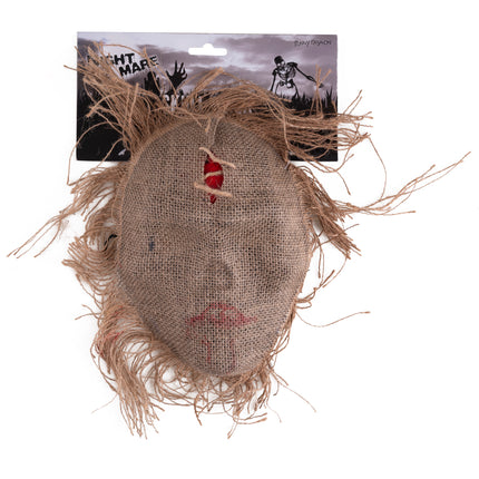 Masker doodskop jute op verpakkingskaart, met rode stiksellijn bij de mond en losse jutedraden