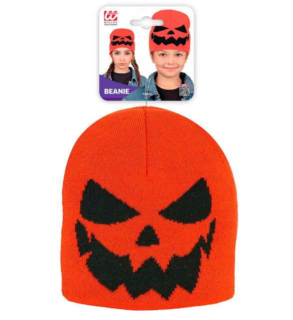 Muts pompoen in verpakking, oranje beanie met zwarte jack-o-lantern-grijns