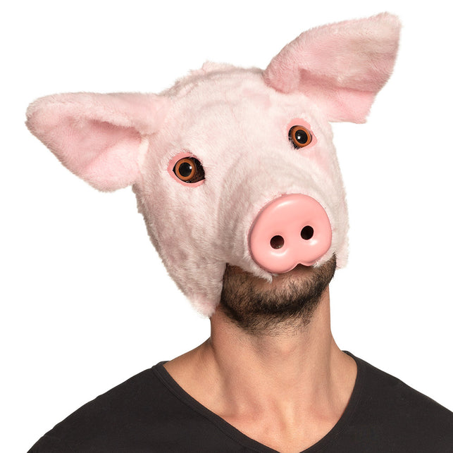 Pluchen varken masker roze met flaporen en snuit, gedragen door man als halfmasker op themafeest