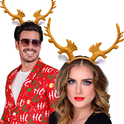 Rendierhorens gedragen door man en vrouw bij een rode kersttrui tijdens Kerst