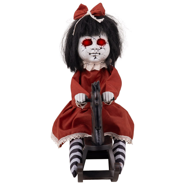 Rockin Rosie animatronic vooraanzicht met gebarsten wit gezicht, rode strik en gestreepte kousen