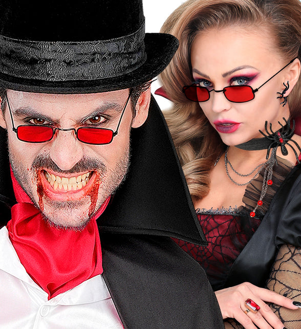 Rode vampieren bril gedragen door man en vrouw in vampierenoutfit op Halloween
