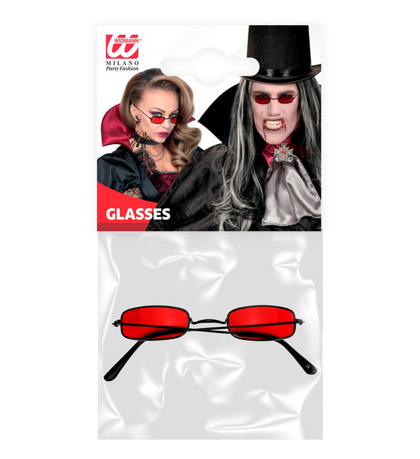 Rode vampieren bril in verpakking met zwarte ijzeren poten, voor Halloween