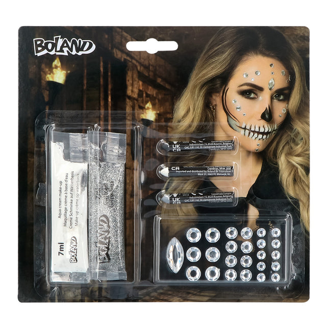 Schminkset diamantenschedel van Boland met witte crèmeschmink, zilveren glittergel, drie sticks en 25 steentjes