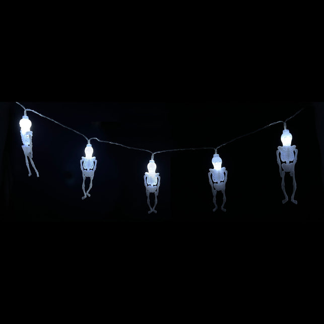 Skelet lichtsnoer van 165 cm met vijf witte LED-skeletjes aan doorzichtig snoer