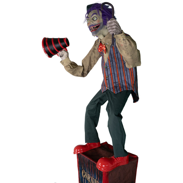 Speakin' Spencer animatronic zijaanzicht met rode clownschoenen op de decorsokkel