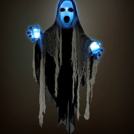 Spook decoratie in het donker met blauw oplichtend hoofd en handen als halloweendecoratie