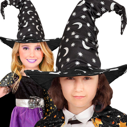 Twee kinderen met de sterrenpunthoed als heks en tovenaar voor Halloween