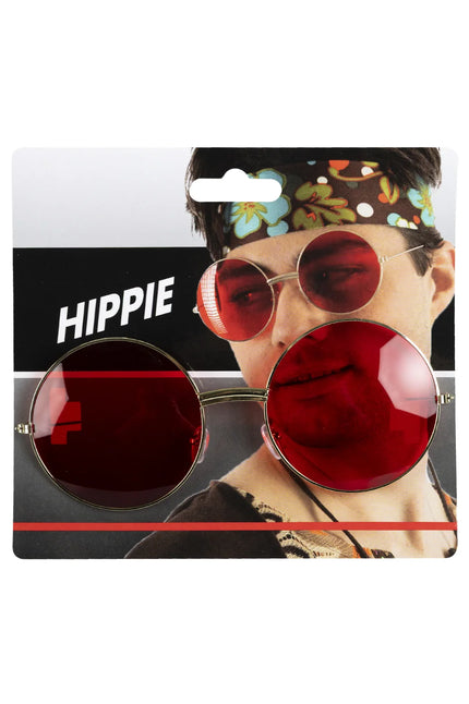 Uilebril met groot goudkleurig montuur en ronde rode glazen op hippiekaart, voor een hippiefeest