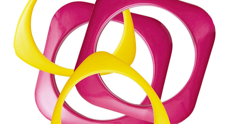 Widmann SRL Geel met roze disco armbandjes