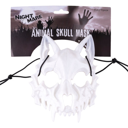 Wit dierenschedelmasker van pvc met zwart elastiekkoord en uitstekende hoektanden op verpakkingskaart