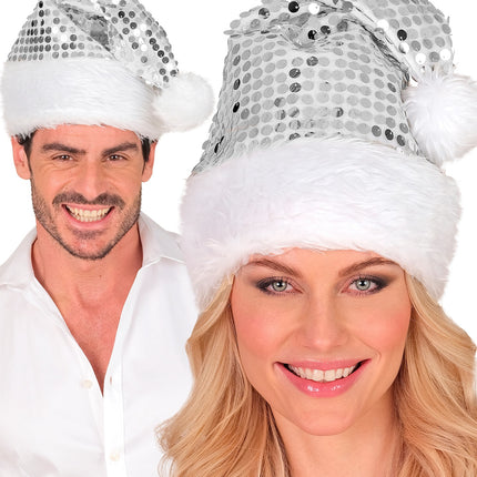Zilveren pailletten kerstmuts gedragen door dame en heer op een kerstborrel