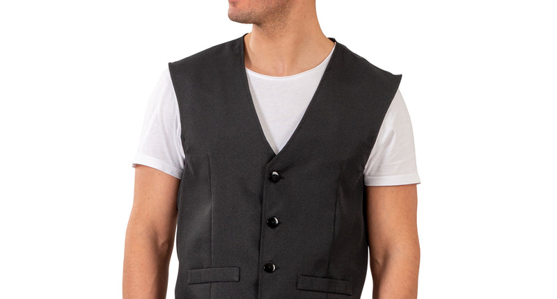 Zwart vest voor heren, mouwloos gilet met V-hals, vier knopen en twee paspelzakjes, gedragen op jeans
