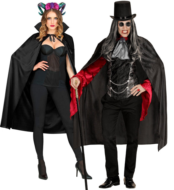 Zwarte cape gecombineerd met een vampierlook voor een Halloweenfeest