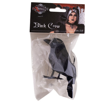 Zwarte kraai in verpakking met clip, gedragen in het haar bij een gothic Halloweenlook